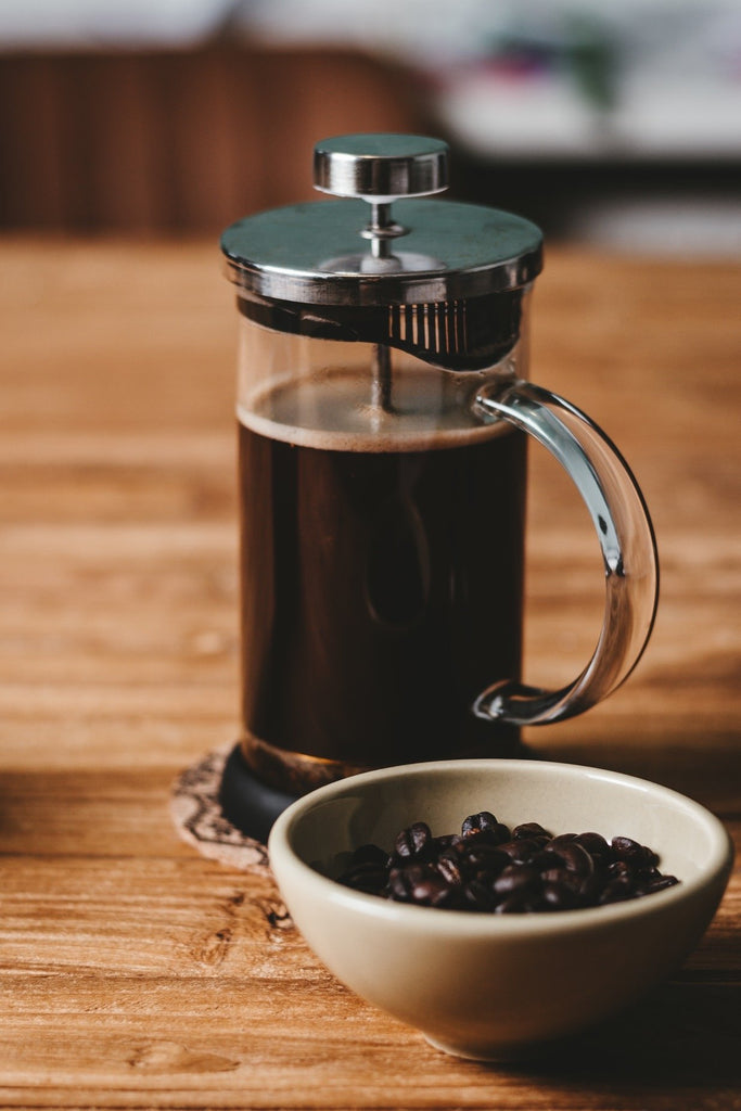 french press cafetiere with coffee beans home barista